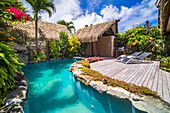 Luxury Villa accommodation with private outdoor swimming pool and seating area with sun loungers, Muri, Rarotonga, Cook Islands