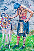 Native American with traditional costume participates at the festival of Valle del Maiz in San Miguel de Allende ,Mexico.
