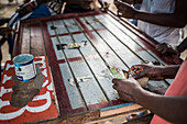 Gambling in Ranomafana, a common past time on a Sunday, Madagascar Central Highlands