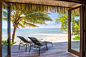 Luxury Villa accommodation with sea views of the tropical Pacific ocean and palm trees, Muri, Rarotonga, Cook Islands