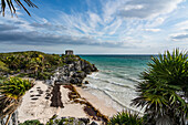 The Temple of the Wind God in the ruins of the Mayan city of Tulum on the coast of the Caribbean Sea. Tulum National Park, Quintana Roo, Mexico.