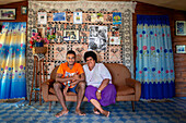 Family inside a house in Solevu island and Yaro island in Malolo Island Mamanucas island group Fiji