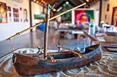 Handmade polynesian boat souvenirs. Souvenirs stall in Papeete Municipal covered Market, Papeete, Tahiti, French Polynesia, Tahiti Nui, Society Islands, French Polynesia, South Pacific.