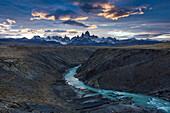 The Fitz Roy Massif at sunset, viewed over the canyon of the Rio de las Vueltas in Los Glaciares National Park near El Chalten, Argentina. A UNESCO World Heritage Site in the Patagonia region of South America.