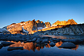 Dragontail at sunrise from Tranquil Lake, The Enchantments, Alpine Lakes Wilderness, Washington.