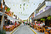 Sidewalk restaurants in Sayulita, Riviera Nayarit, Mexico.