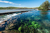 Giant Springs flows into the Missouri River at Giant Springs State Park, Great Falls, Montana.
