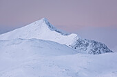 Skredfloget mountain peak at dusk in winter, Senja, Troms og Finnmark county, Norway, Scandinavia, Europe