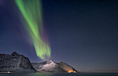The Aurora Borealis (Northern Lights) over Steinfjord and Skinnarmen mountain, Senja, Troms og Finnmark county, Norway, Scandinavia, Europe