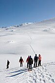 Snowshoeing At Grimsel Pass Which Offers Fantastic Views Over The Goms Valley.