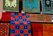 Colorful Carpets Hanging Outside Shop