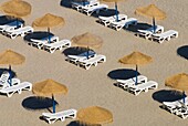 Rows Of Lounge Chairs With Umbrellas On Beach Of Torremolinos, Elevated View