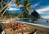 Fishing Boats Beneath Palm Trees On Beach, With Petit Piton In Background
