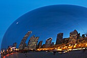 City Skyline Reflecting In 'cloud Gate' (The Bean) Sculpture At Dusk