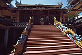 Dragon Decorated Staircase And House