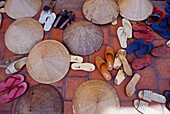 Shoes And Conical Hats At Cau Dai Temple