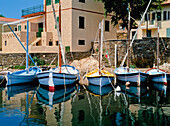 Sailboats Moored In Harbor