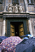 People Under Umbrellas Outside Duomo