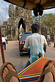 Rickshaw And Car By Bayon Temple, Angkor,Siem Reap,Cambodia