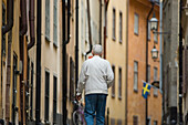 Man Walking In Old Town,Rear View, Stockholm,Sweden