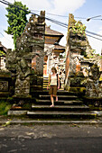 Female Tourist Visiting Temple