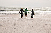 Three Surfers On Lido Beach