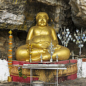 Eine goldene Buddha-Statue; Luang Prabang, Provinz Luang Prabang, Laos.