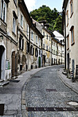 A Cobblestone Alley Runs Between Residential Buildings; Slovenia