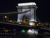 Szechenyi Chain Bridge illuminated at nighttime; Budapest, Budapest, Hungary