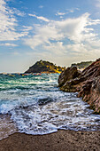 Beach view from Tossa de Mar of Castell de Tossa, which was built in 1187; Tossa de Mar, Girona, Spain