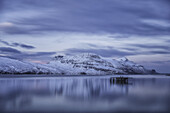 Beautiful sunset blue light over the fjord near Djupavik; West Fjords, Iceland