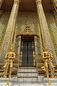 Temple of the Emerald Buddha golden guardians, Grand Palace; Bangkok, Thailand