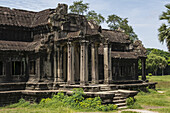 Ruined stone temple with columns, Angkor Wat; Siem Reap, Siem Reap Province, Cambodia