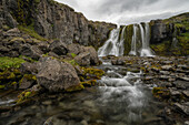 Waterfall along the road on the West Fjords; West Fjords, Iceland