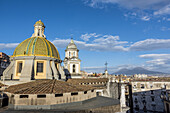 View of Mount Vesuvius and church dome; Naples, Italy