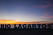 City sign at sunset; Rio Lagartos, Yucatan, Mexico