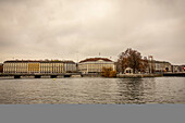 Colourful residential buildings along the water of Lake Geneva; Geneva, Geneva, Switzerland