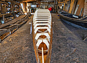 Construction of a gondola, the wooden frame in a workshop; Venice, Italy