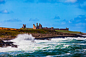 View Of Dunstanburgh Castle from Craster Harbour; Craster, Northumberland, England