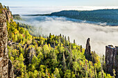 Sunrise over a misty, foggy valley in the Canadian Shield; Dorian, Ontario, Canada