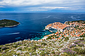 Hilltop overview of the coastal city of Dubrovnik and the Adriatic Sea; Dubrovnik, Dubrovnik-Neretva County (Dubrova?ko-neretvanska županija), Croatia