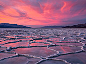 Sunset over the Badwater salt flats on Death Valley National Park; California, United States of America