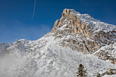 The peak of Sass de Stria mountain in the snow, the Dolomites; Province of Belluno, Veneto, Italy