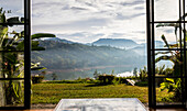 View over Castlereagh Reservoir from Camellia Hills, Teardrop Boutique, tea estate bungalow hotel in Hill Country; Castlereagh Valley, Nuwara Eliya District, Central Province, Sri Lanka