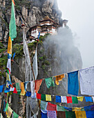 Prayer Flags Hanging In Front Of Tiger's Nest Monastery; Paro District Bhutan