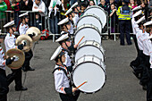 Percussionists In A Marching Band In A Parade; County Dublin Ireland