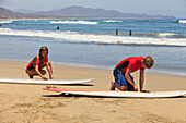 Instructors And Students With Surf Lessons At Cerritos Beach; Todos Santos Baja California Sur Mexico