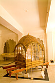 India, Rajasthan, Royal gold carriage on display at Fort Mehrangarh palace; Jodhpur