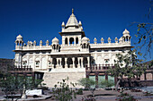 India, Mandore Cenotaphs Of Jodhpur Rulers, Exterior Of White Building Against Blue Sky, View From Front.