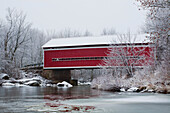 Red Covered Bridge In The Winter; Adamsville Quebec Canada